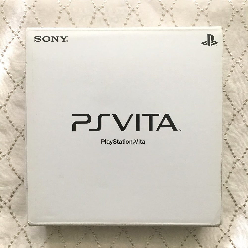 Sony PS Vita 1000 Crystal White Console Assassins Creed III Bundle Boxed